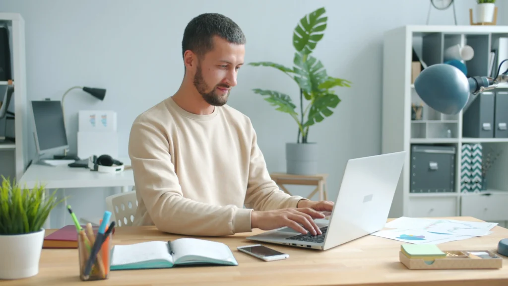 A man working on a laptop